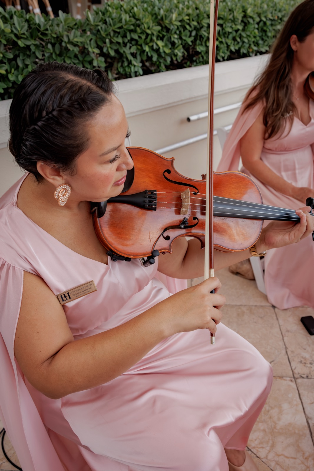 Luxe Harmony String Quartet performs Miami Wedding Music in pink matching dresses